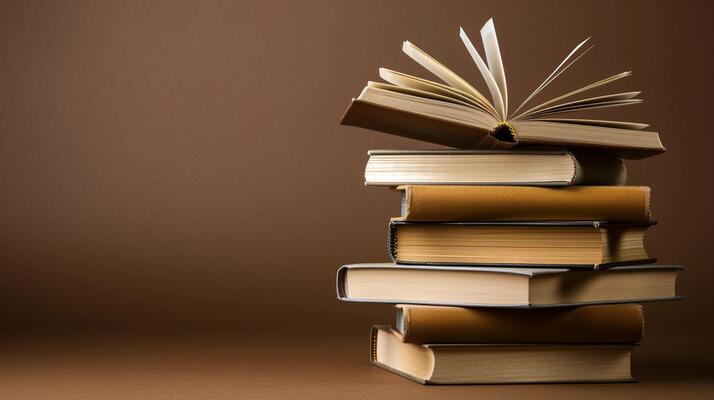 stack-of-books-on-a-brown-background-concept-for-world-book-day-photo stack-of-books-on-a-brown-background-concept-for-world-book-day-photo